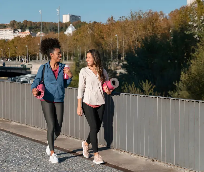 full-shot-of-friends-walking-ready-for-exercise-morning